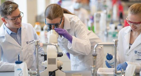 UNH Manchester Academics Students in Biology Lab